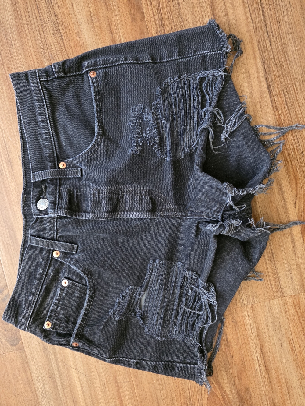 Levi's Black Distressed Denim Cutoff Shorts